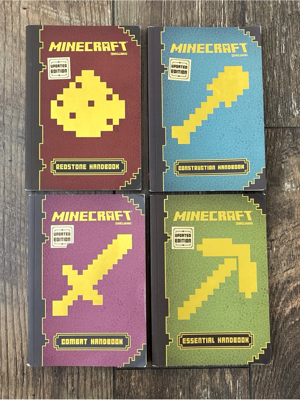 4 Minecraft Guide Handbook Books: Redstone, Essential, Combat, Construction